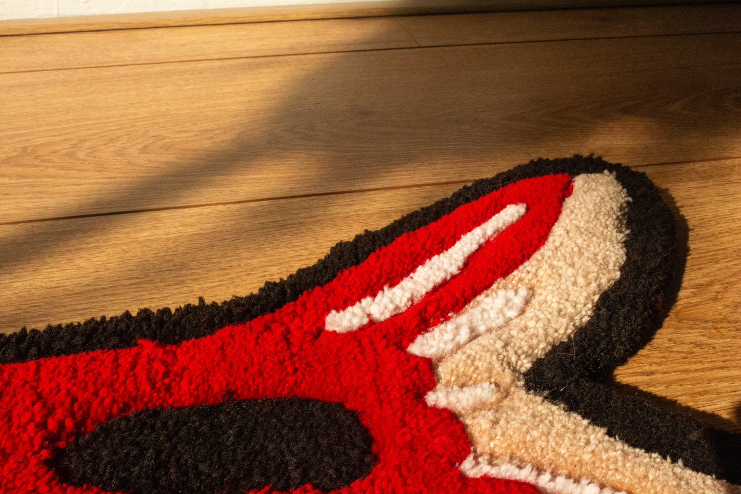 Chili Rasbora (Boraras brigittae) Rug – Tail Close-Up Showcasing Vivid Red and Black Accents