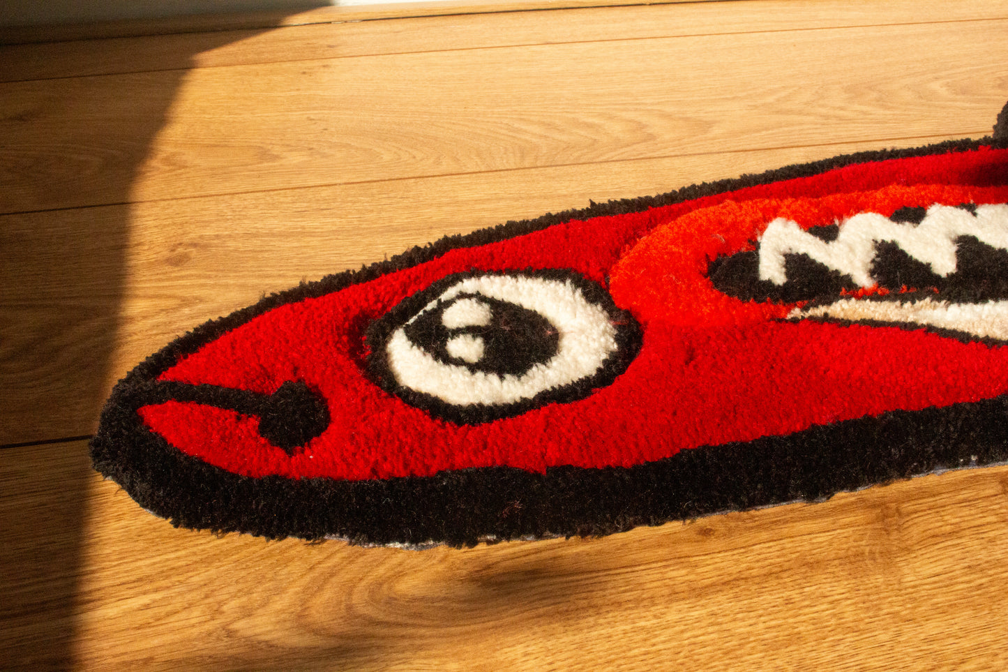 Detailed Head of Chili Rasbora (Boraras brigittae) Rug – Handmade Design with Rich Red and Black Markings
