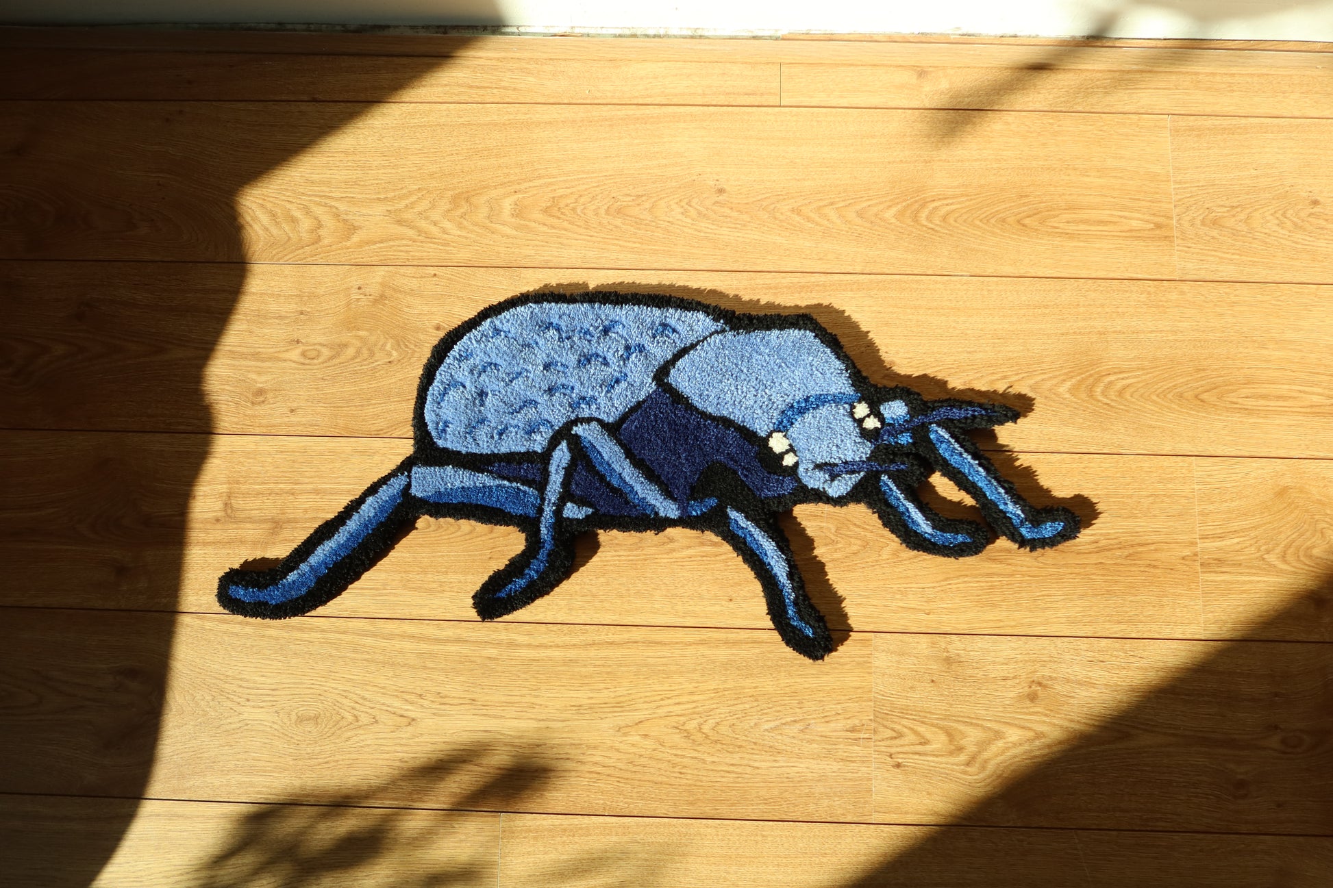 Handmade Blue Death Feigning Beetle (Asbolus verrucosus) Rug – Unique, Cozy Arthropod-Themed Decor
